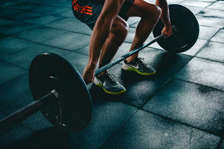 A person doing deadlifts